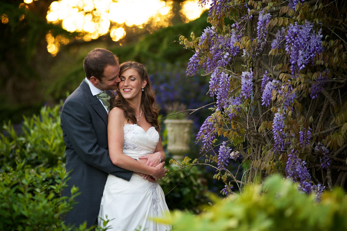 Ryan and Julia are photographed outside Boys Hall in Kent on their wedding day