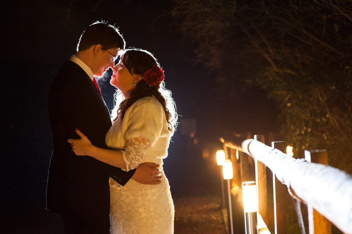 A flash lit photograph of Charlotte and Marks wedding in Kent