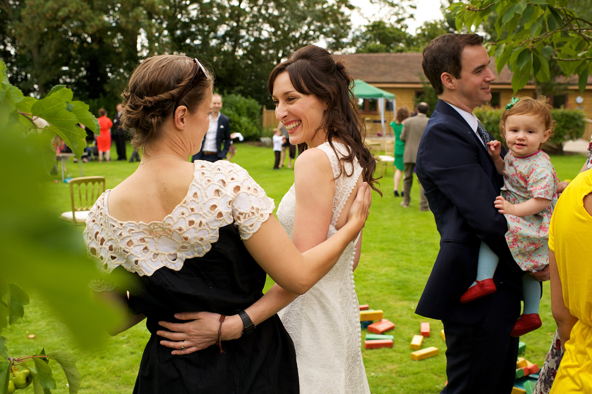 juliette greets her friend at her wedding day party in Kent