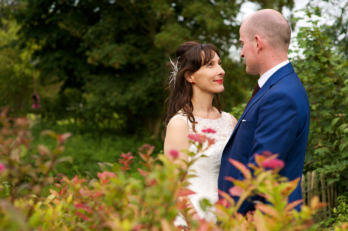 Photograph of Juliette and David in the gardens at Spring grove school in Kent