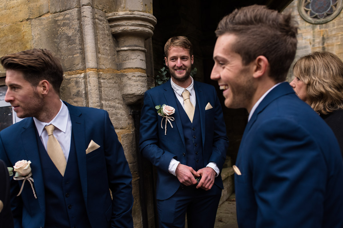 Stuart is photographed with his groomsmen on the day of his Kilndown church wedding in Kent