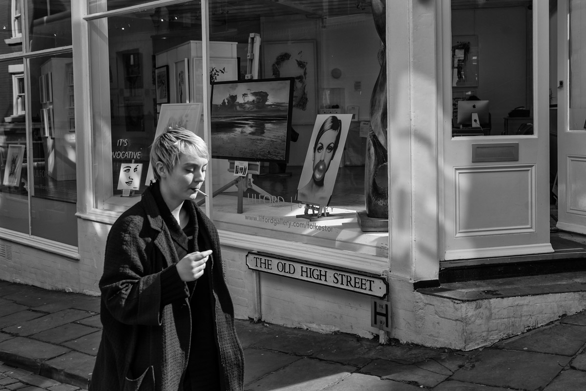 Photograph of young lady smoking a cigaret in Folkestone high street