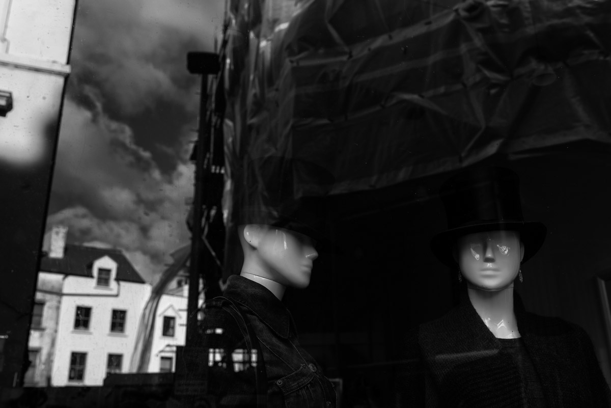 Black and white photograph of mannequins and reflections of buildings in Folkestone Kent