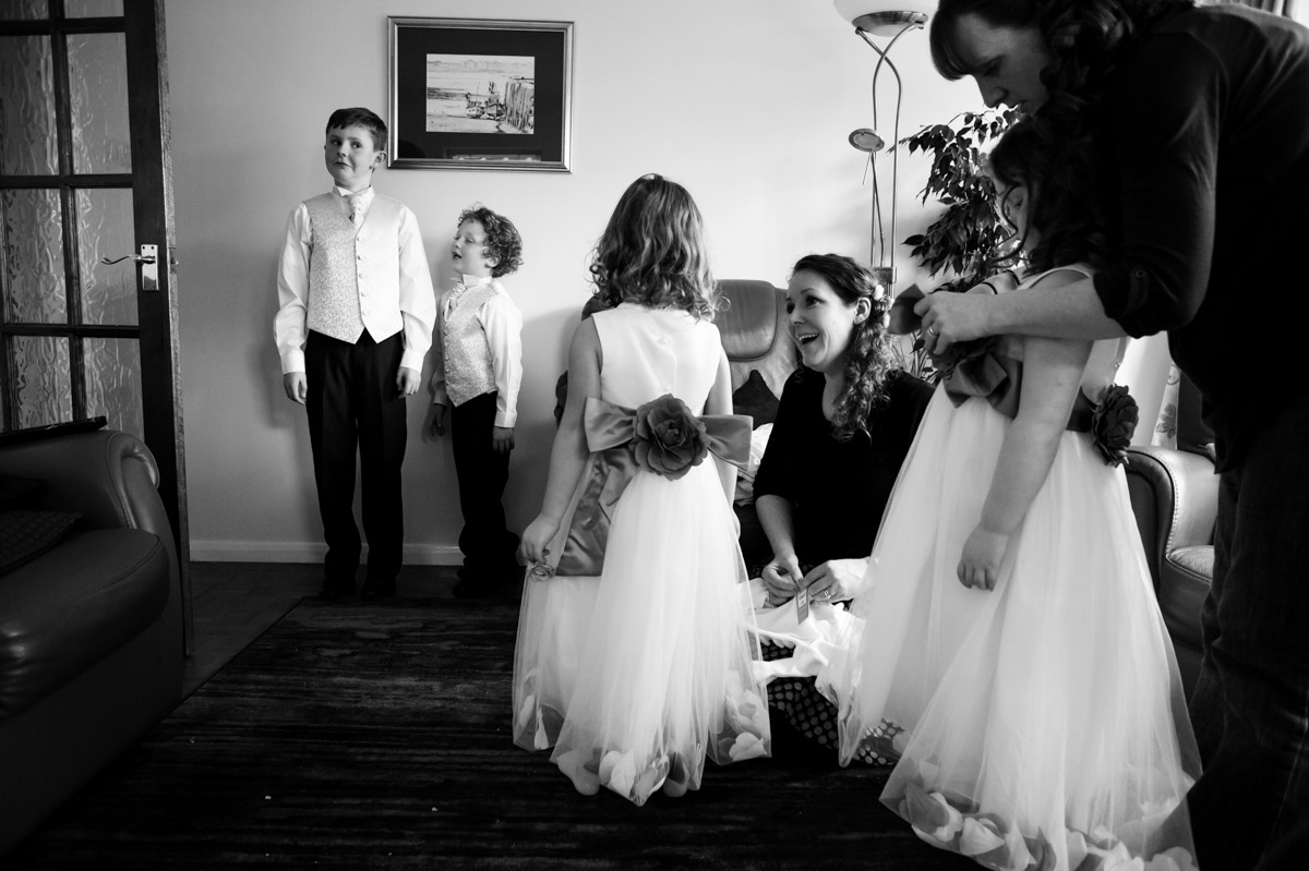 Bridesmaids and pageboys photographed getting ready before Chris and Charlottes Kent wedding