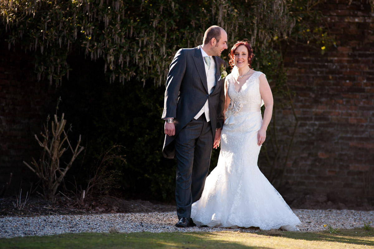 Photograph of Charlotte and Chris in the gardens at the Secret Garden in kent