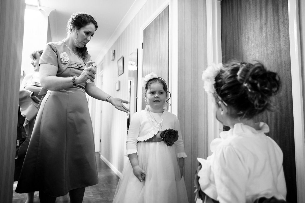 Bridesmaids and flower girls getting ready before Charlotte and Chris Kent church wedding