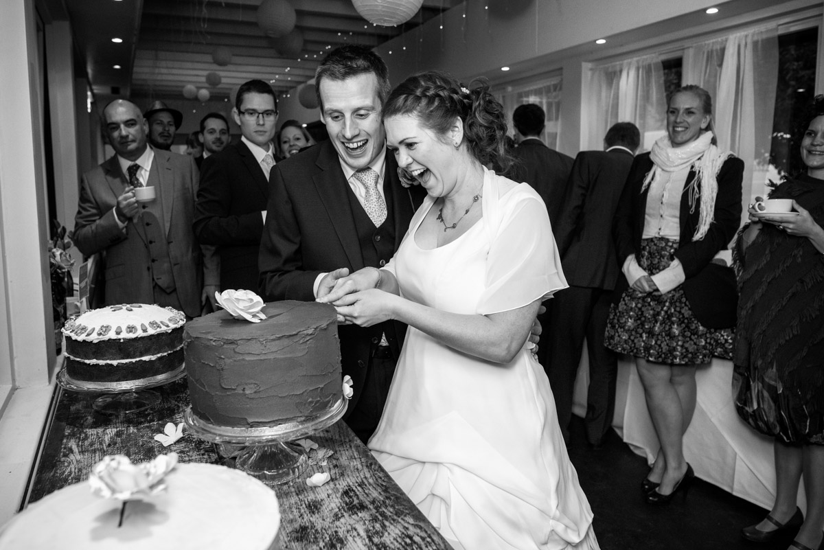 Chris & Debbie photographed cutting their wedding cake