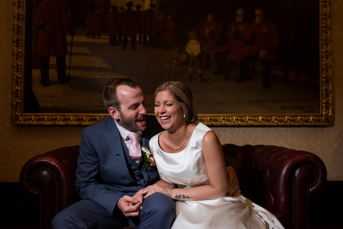 Portrait of Lousie and Mike in Shepherd Neame visitor centre on their wedding day