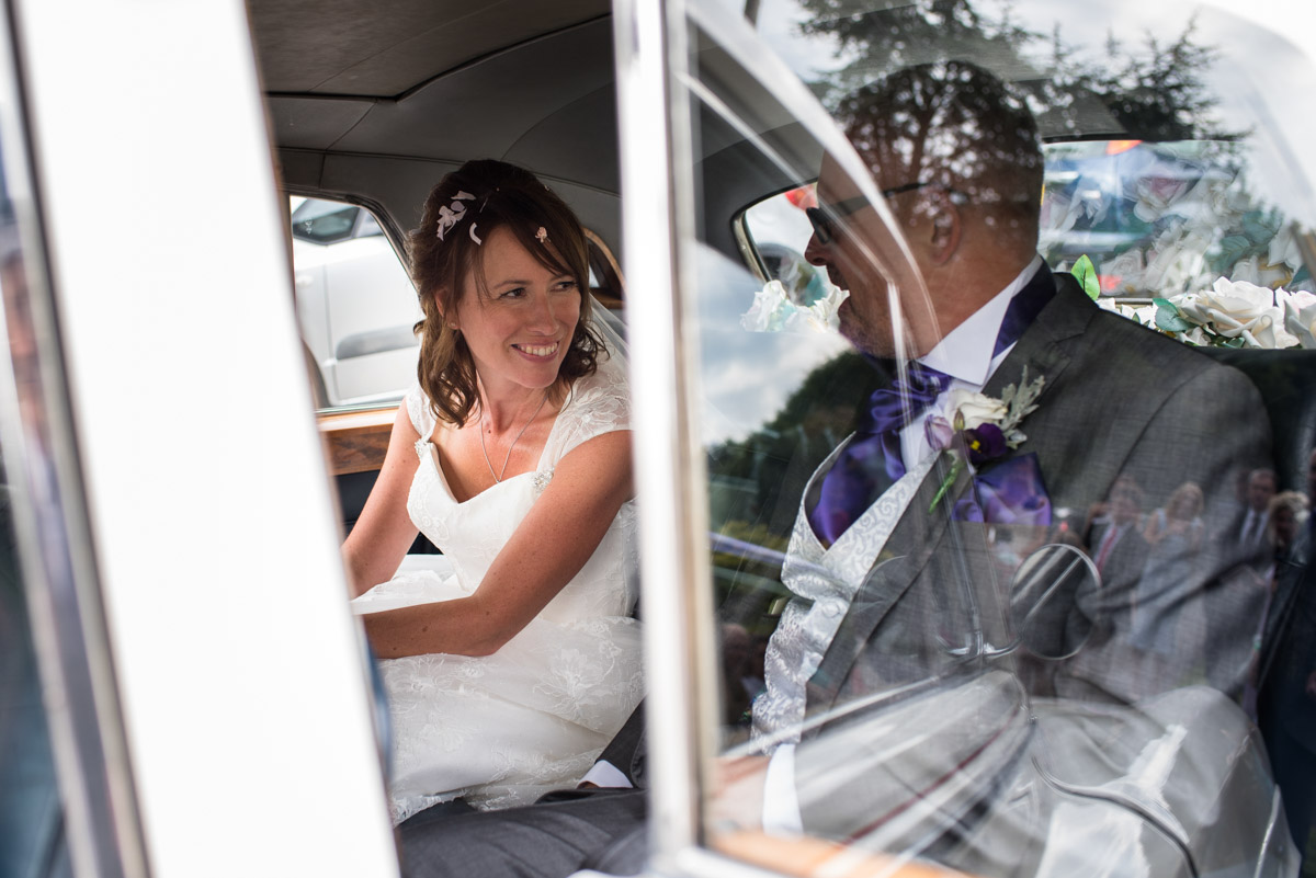 Damon and Claire photgoraphed in wedding car after Kent church ceremony