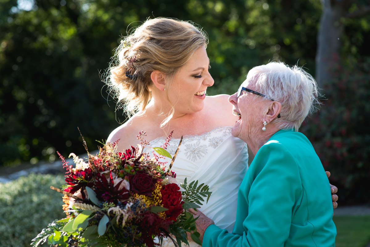 Photograph of bride and her grandmother on her wedding day at Lympne Castle in Kent