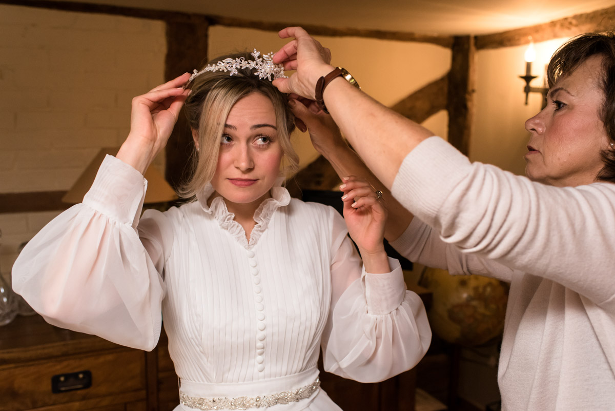 Mum helps Jane get ready on her wedding day in chilham Kent