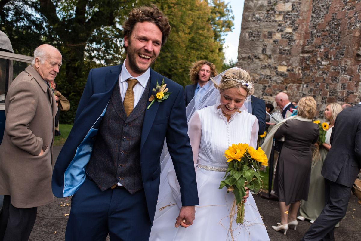 Jane and Steven photographed leaving the church in kent after confetti throw