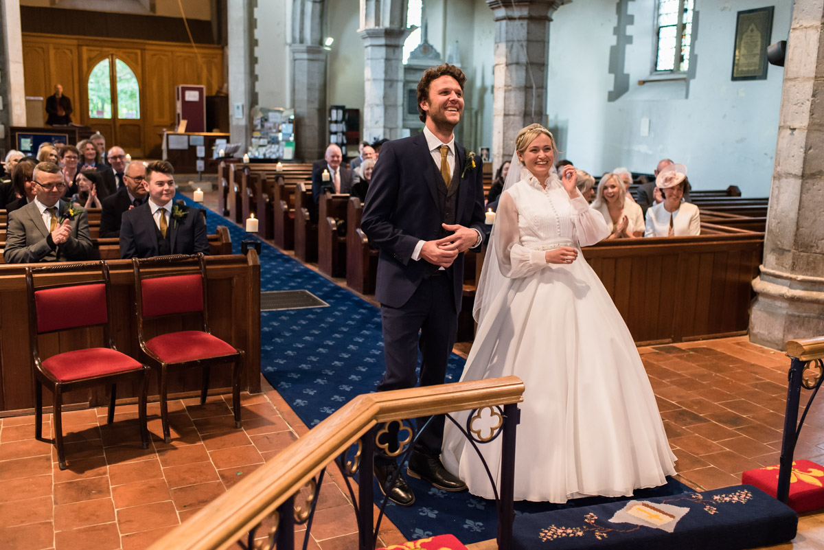 Jane and Steven photographed during their chilham church wedding ceremony