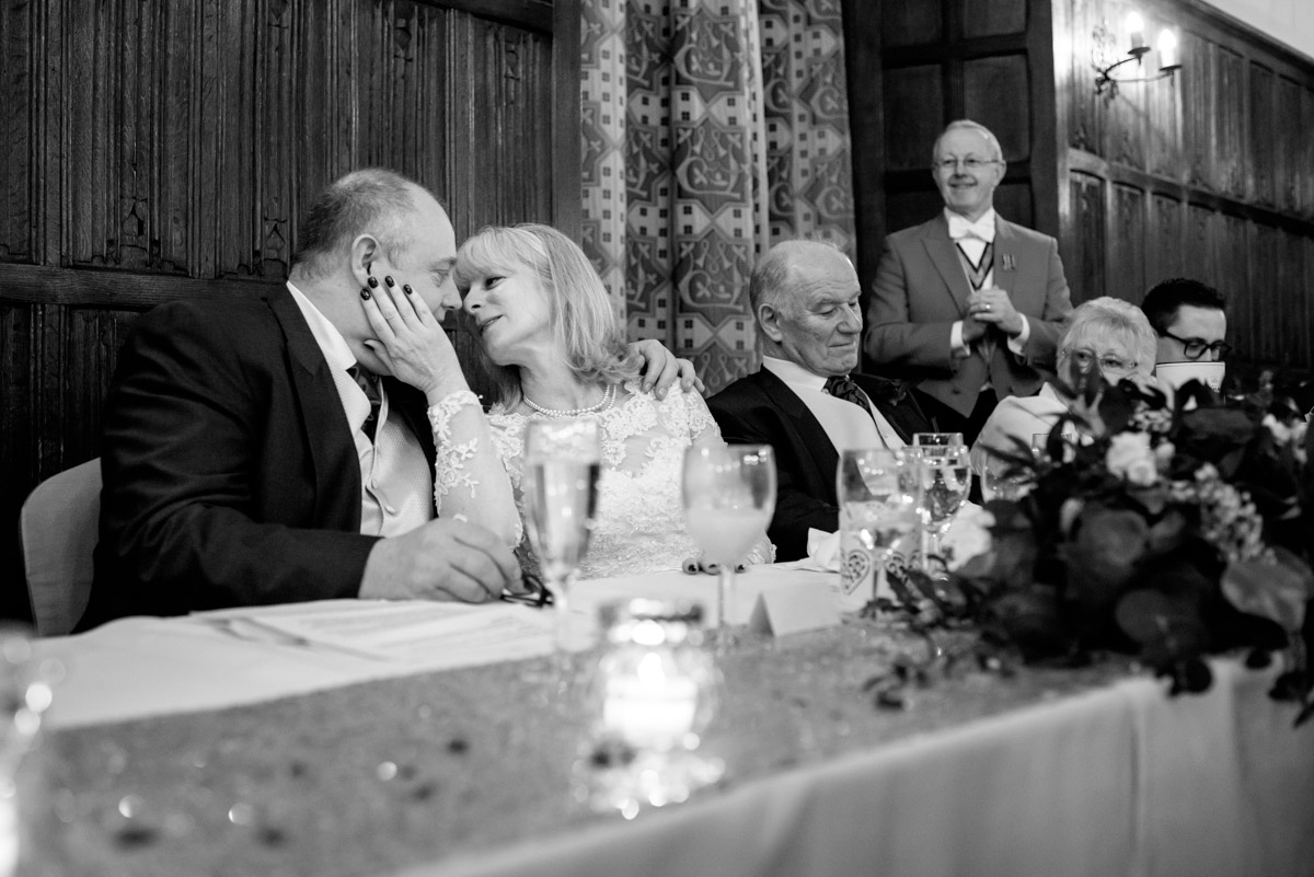 A tender moment between Sue and Nick on their wedding day at Lympne castle