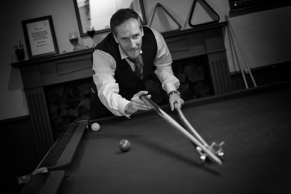 Joe photographed playing snooker before his wedding at Buxted Park Hotel