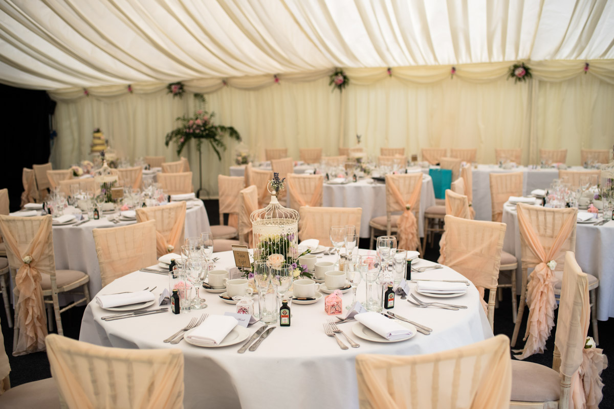 Photograph of wedding details and decorations in the marquee at Arlington Castle in kent