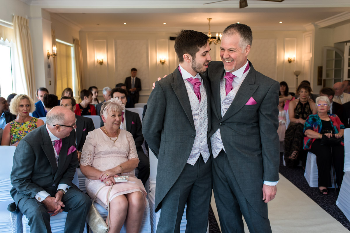 Darren and his son photographed before his Hythe Imperial wedding ceremony