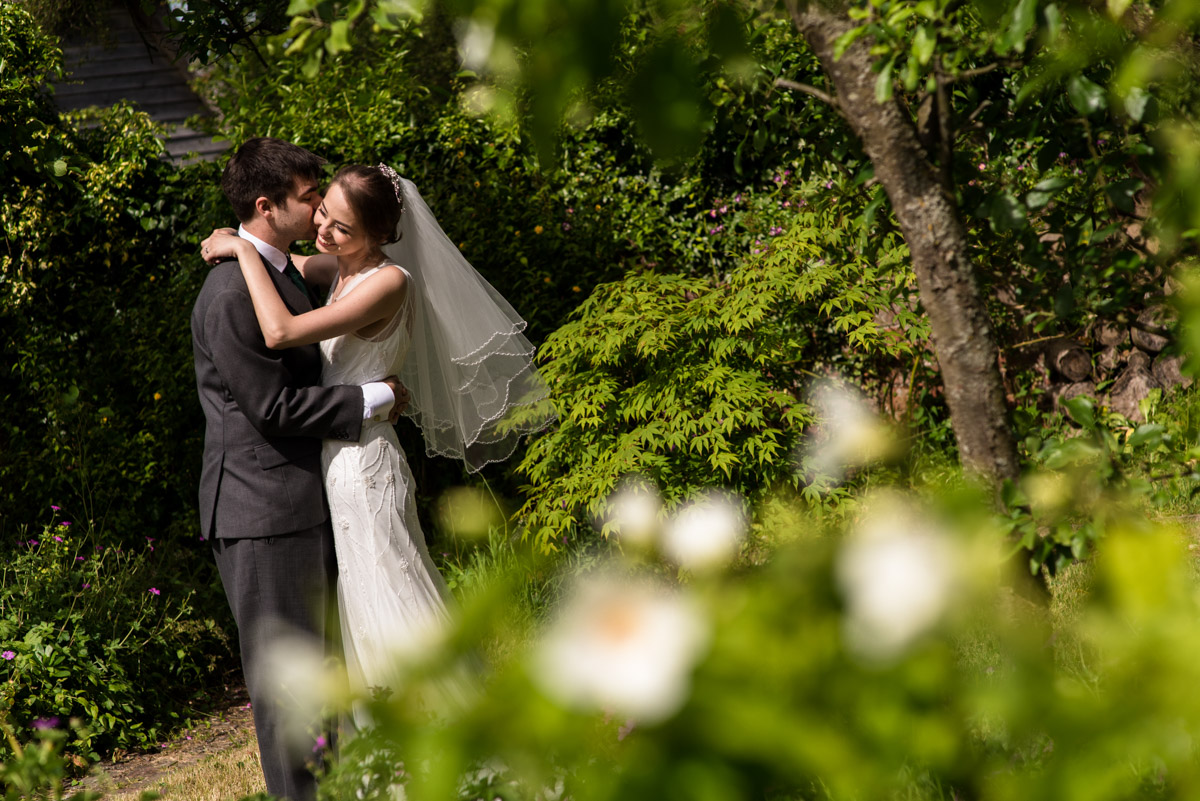 Beth and Tom photographed in the gardens at Ratsbury Barn in Kent