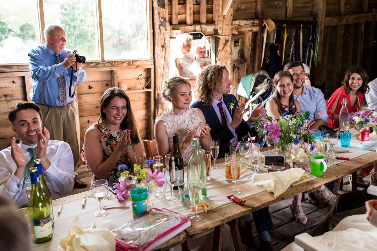 Photograph of wedding guests during reception at Josh and Annes Kent barn reception