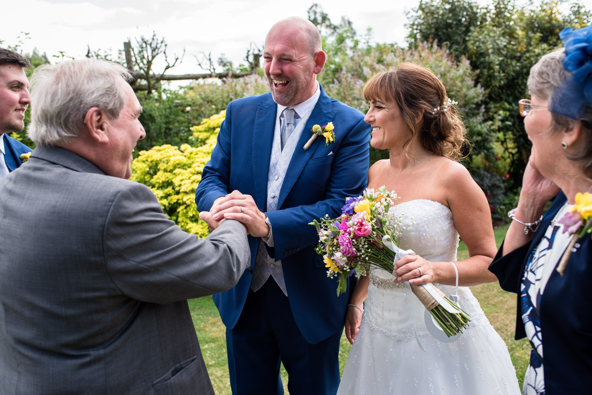 Photograph of Debbies father and Martin after their outdoor wedding at The Gardens Yalding