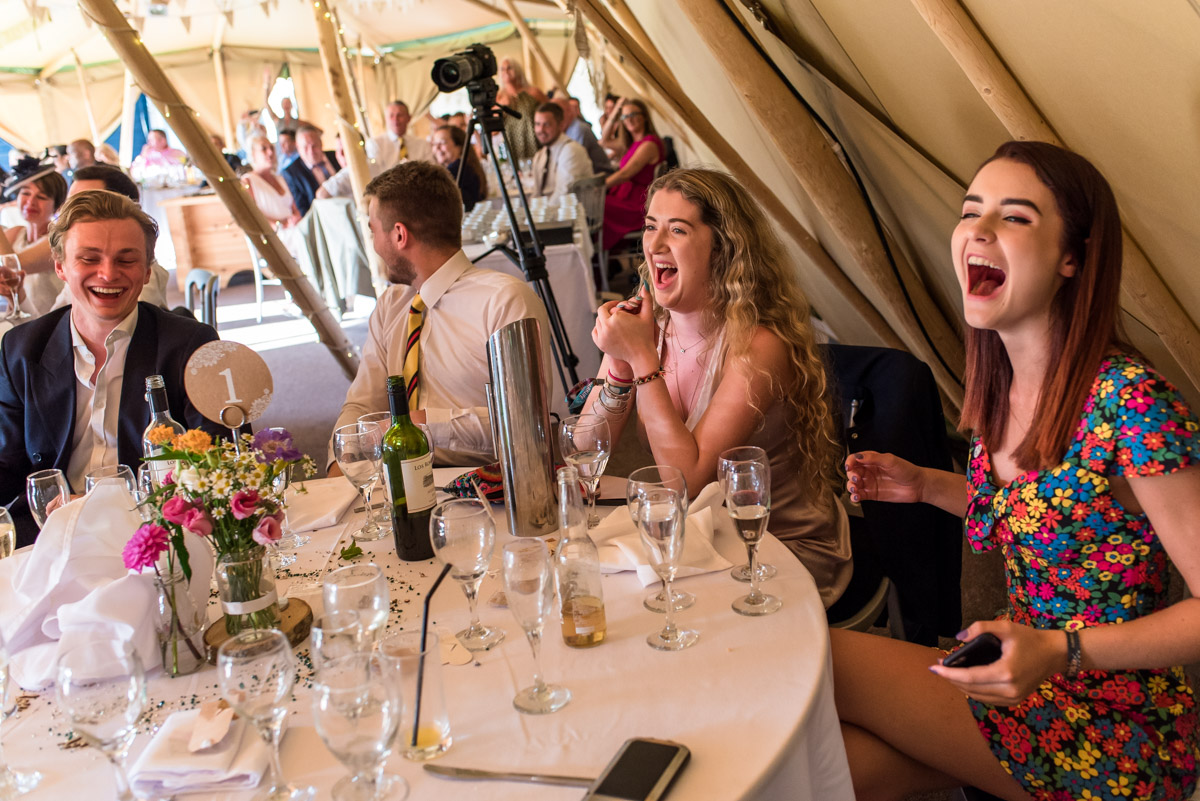 Guests enjoying the speeches at Martin and Debbies wedding at The Gardens Yalding in Kent