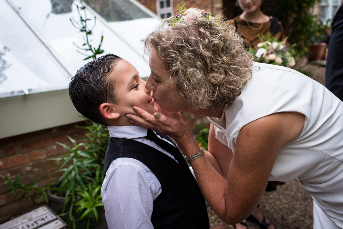 Kate gives her new husbands grandson kiss