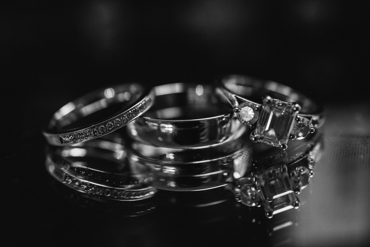 Black and white photograph of wedding rings