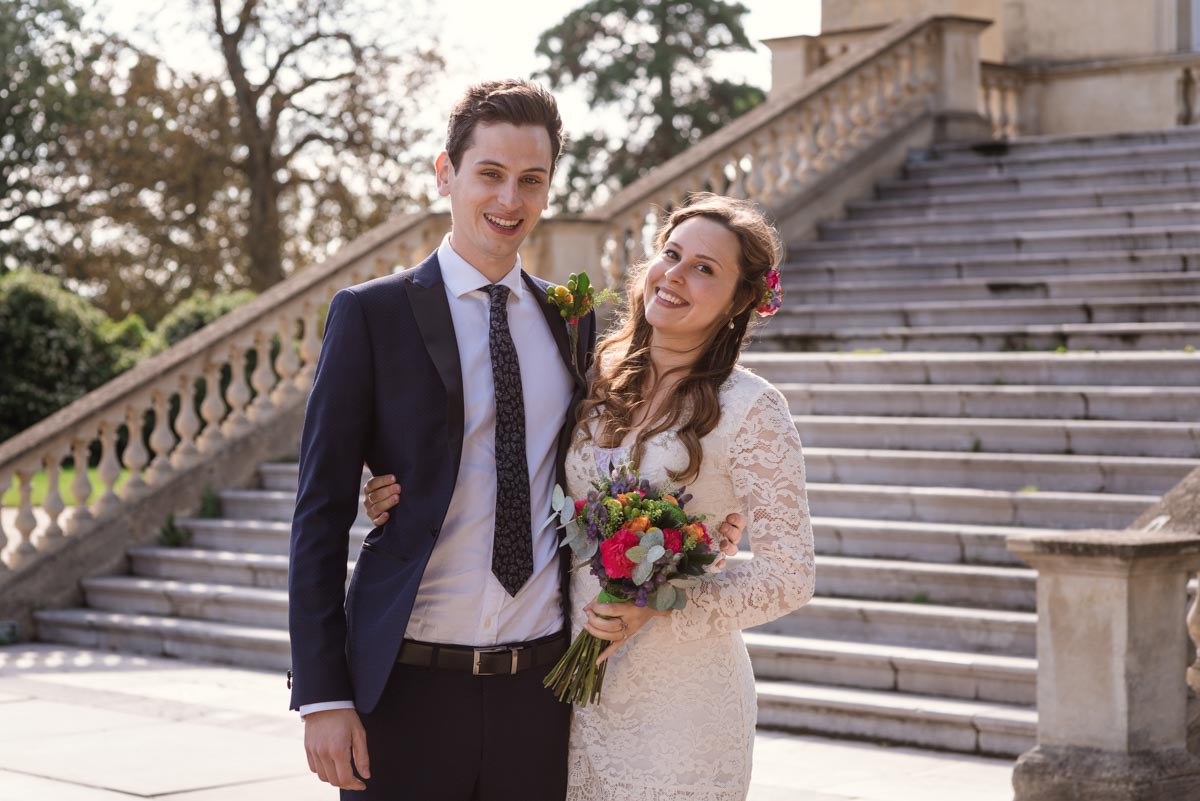 Photograph of Alex and James outside Danson House wedding venue in Kent