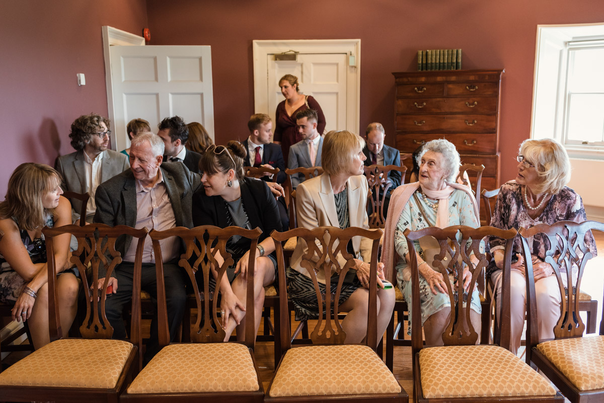 Photograph of wedding guests before John and Lucies wedding at Danson House