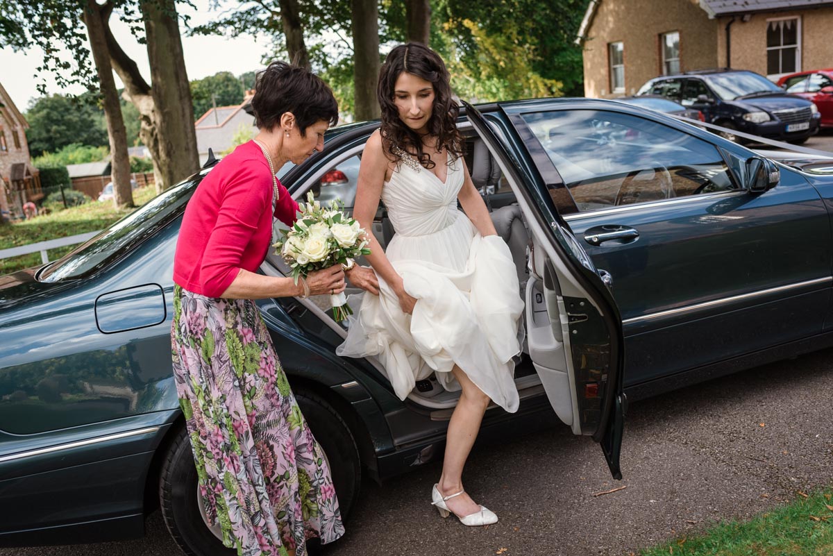 Claire arrives with her mum at Eythiorne Baptist church for her wedding