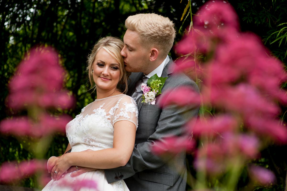 Photograph of Aimee and Billy in the gardens on their wedding day in Kent