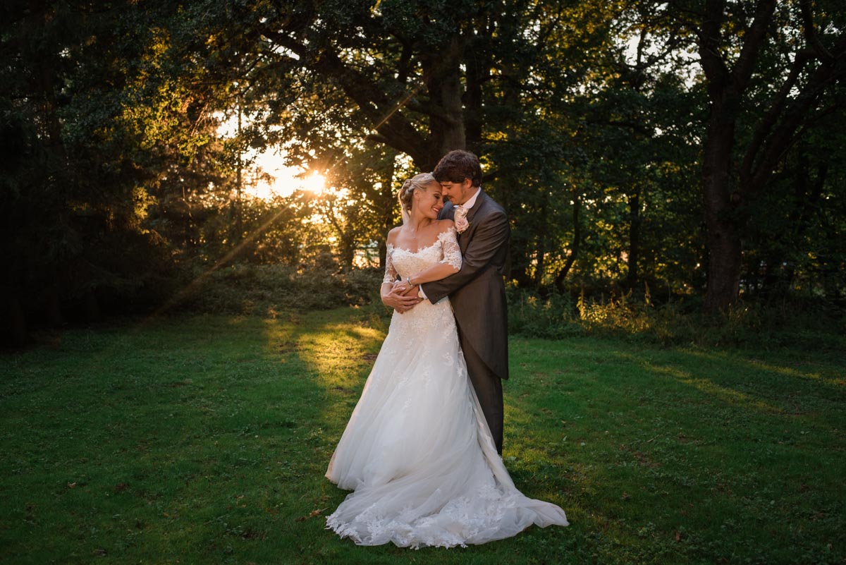 Photograph of James and Rebecca at sunset at their wedding in Kent