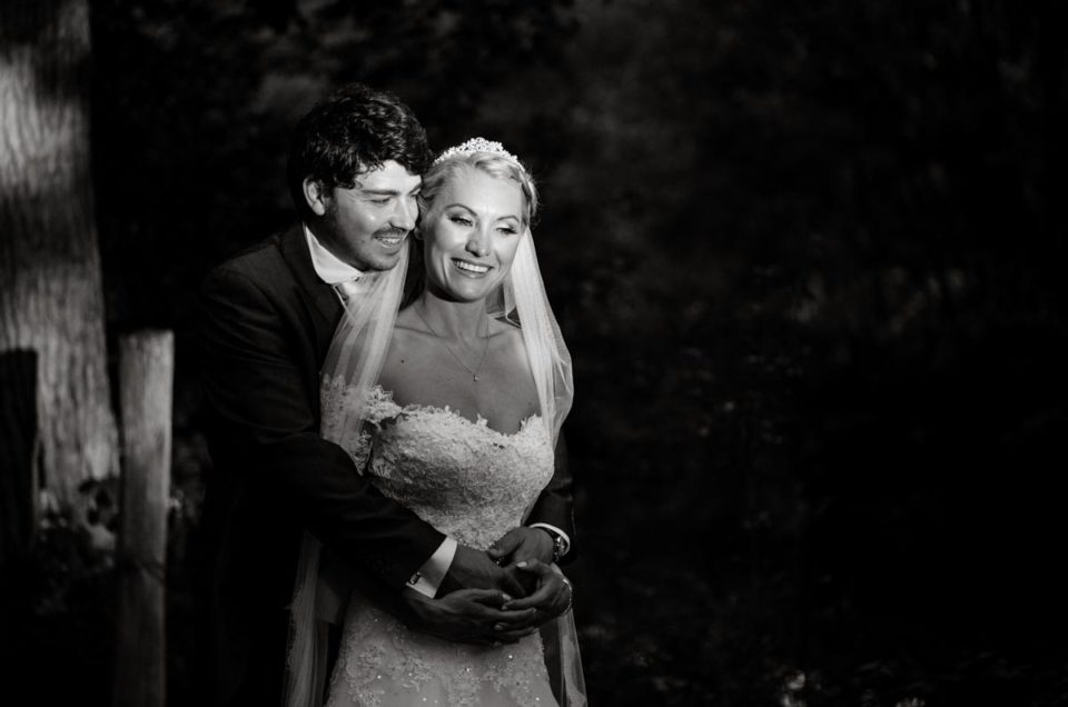 Black and white portrait photograph of James and Rebecca on their wedding day in Kent