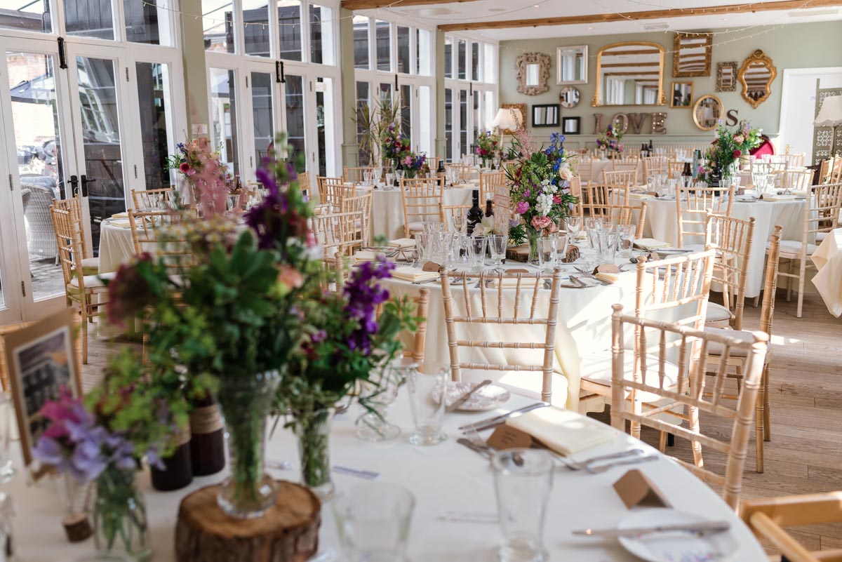 Photograph of inside the Coach house wedding venue at the secret garden in Kent