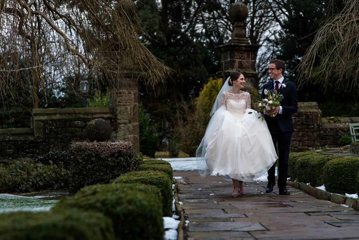 Photograph of Katherine and Tom in Holdsworth House gardens on their wedding day