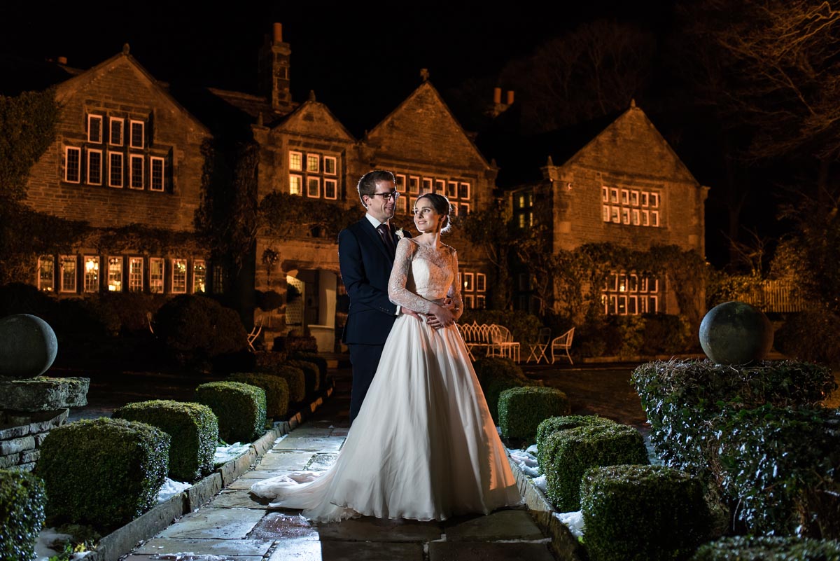 Night time wedding portrait of Katherine and Tom at Holdsworth House in Yorkshire