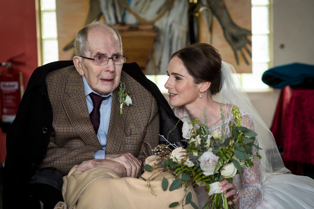 Photograph of Katherine and her grandad on her wedding day in Halifax