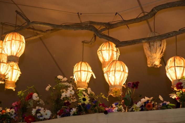 Paper lanterns decorate wedding marquee