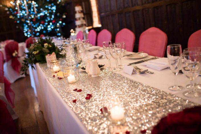 Sparkly festive table runner at Christmas wedding at Lympne Castle