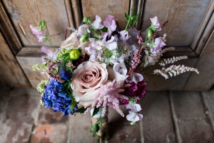 Summer colourful wedding bouquet in blues, mauves and whites
