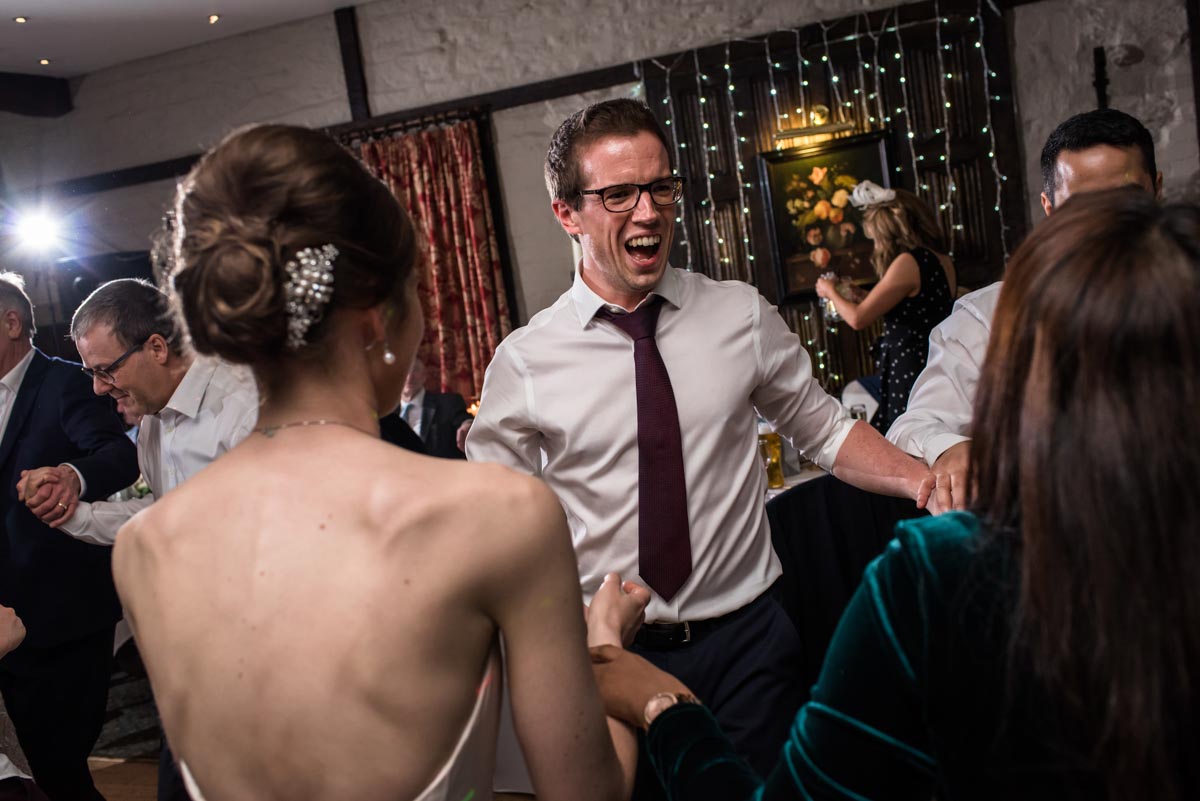 Tom is photographed dancing during his wedding reception