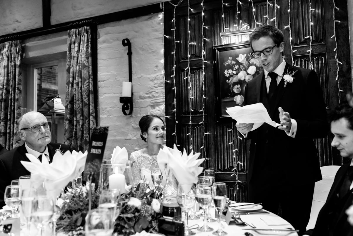 Kent wedding photographer, Helen batt photographs Tom during his wedding speech