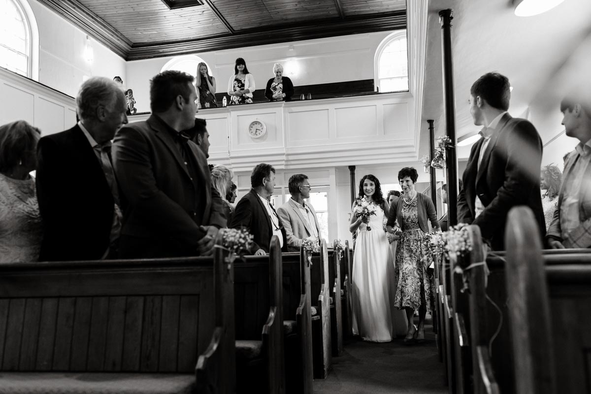 mum escourts daughter into church on her wedding day in Kent