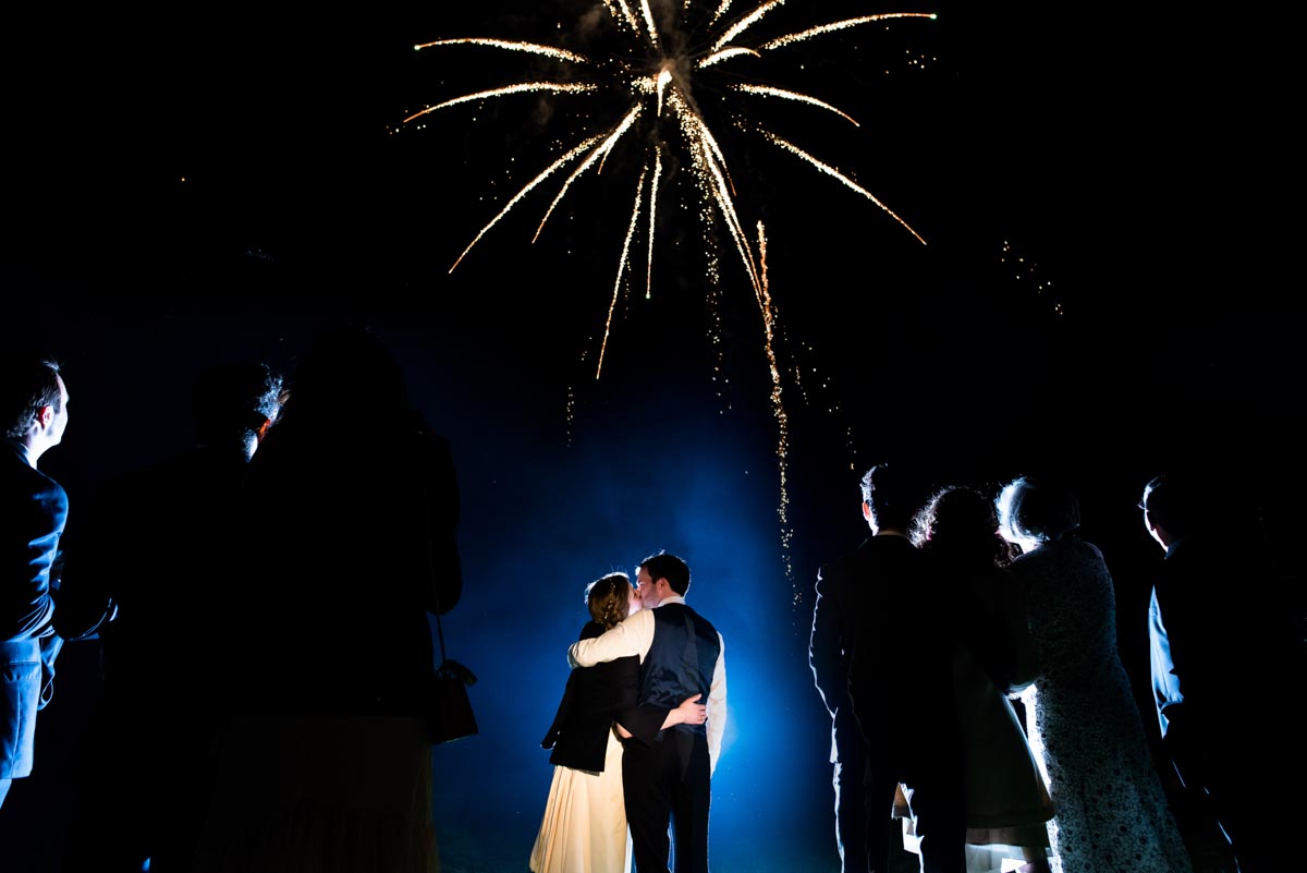 Wedding reception fireworks frame photograph of newly weds