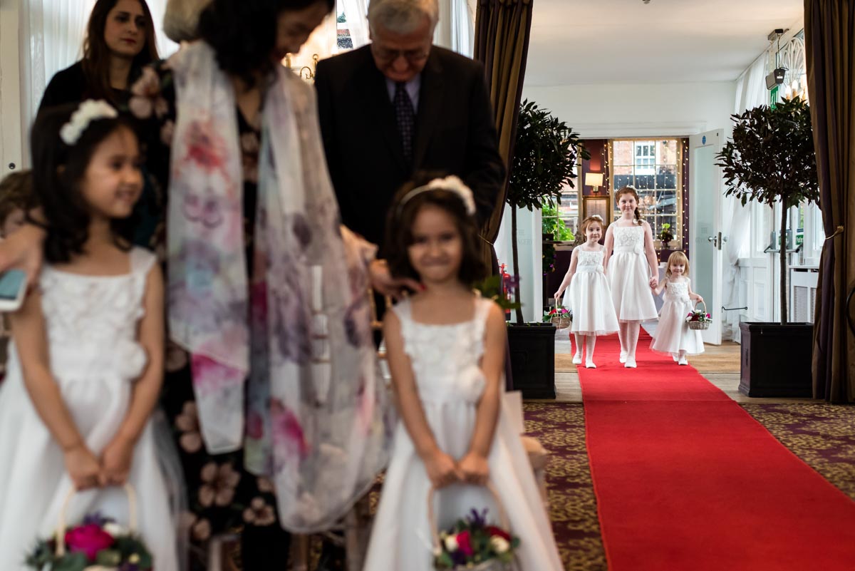 Chilston park hotel wedding photography, bridesmaids enter ceremony