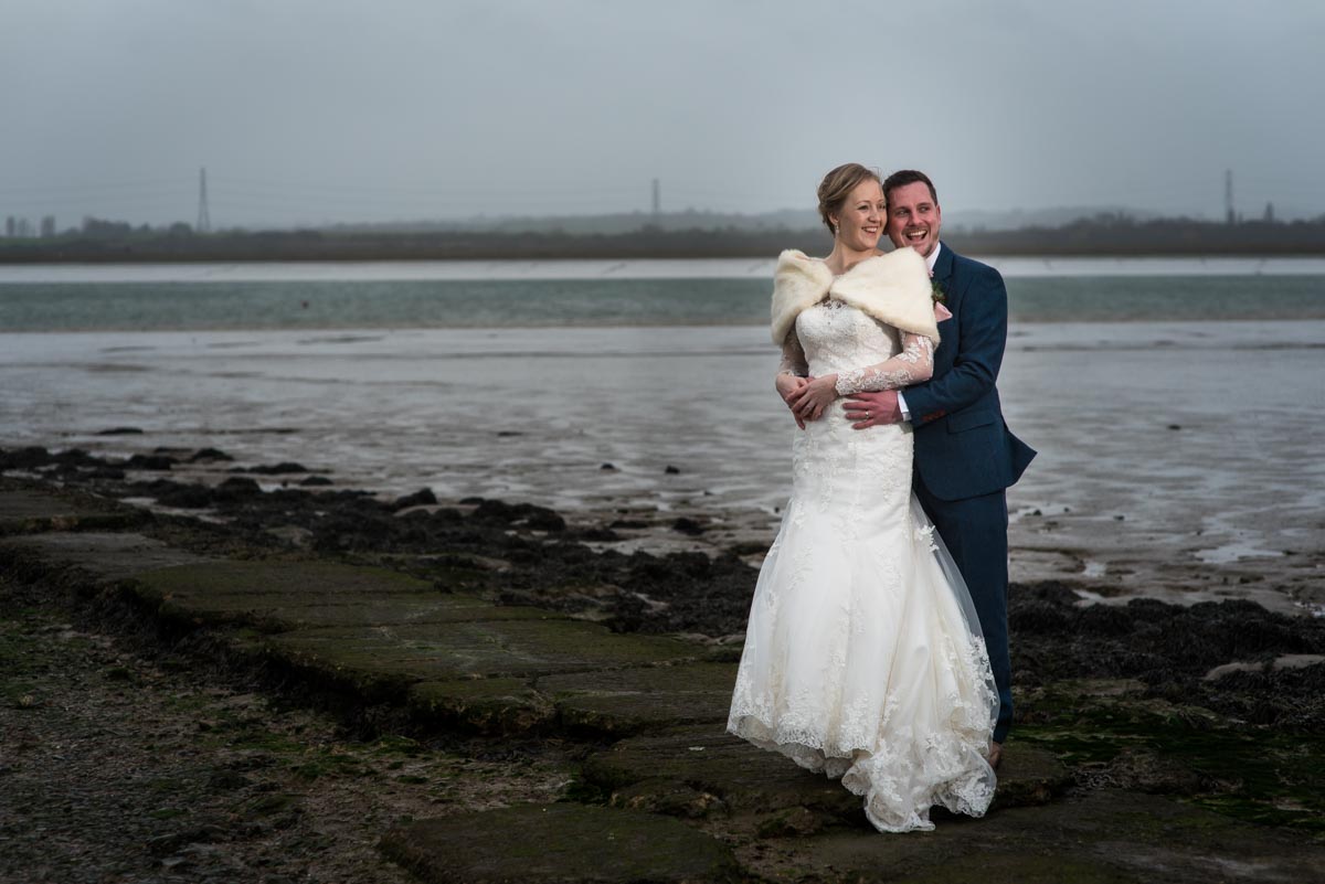 the Ferry House Inn wedding photography. Couple photographs by the estuary.