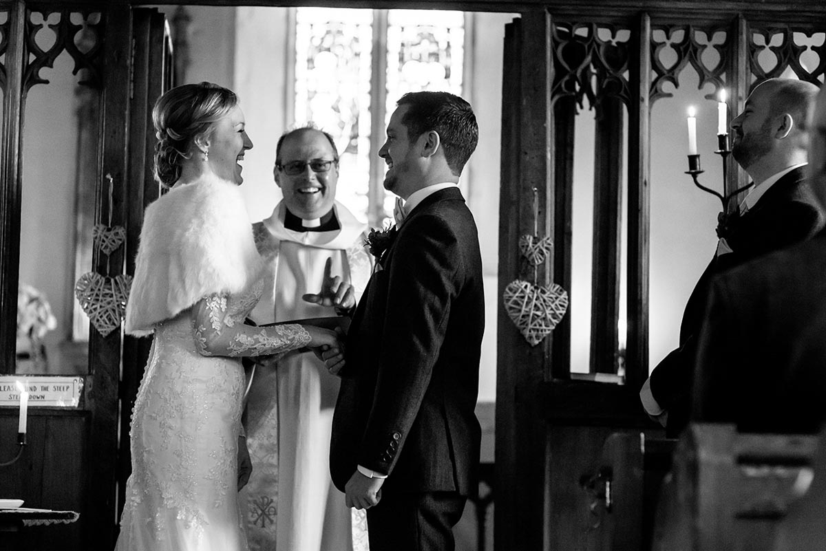 Stephen and Rebecca share a joke during their Kent wedding ceremony