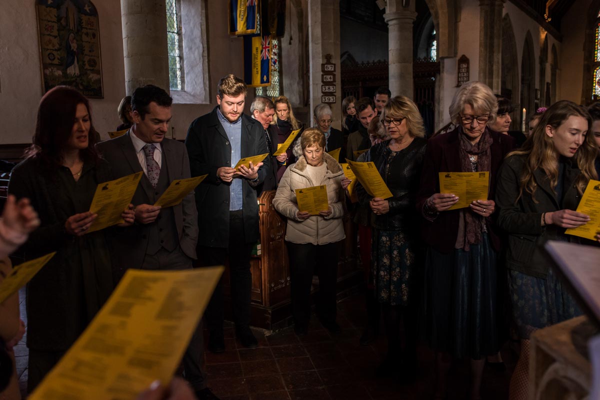 Guests are photographed in church at Emilys christening in Kent
