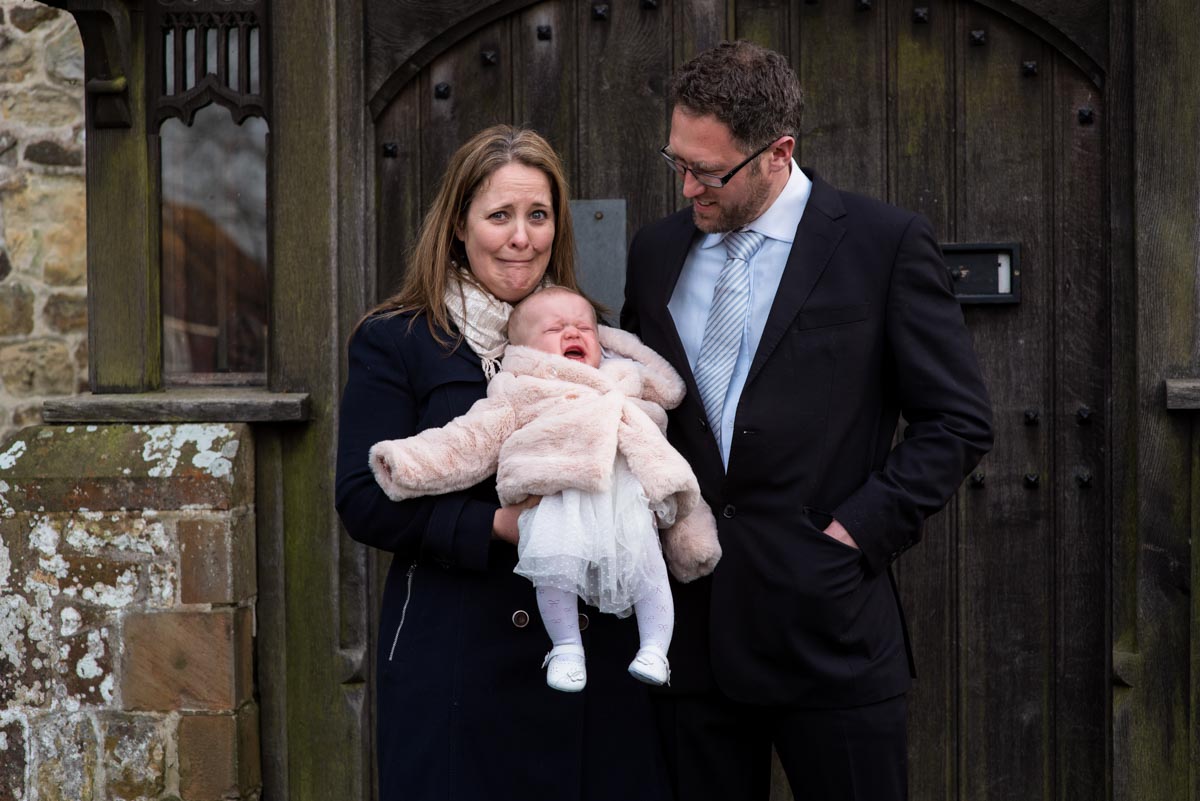 Photograph of Emily and her parents during her christening in Kent