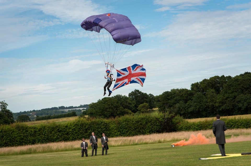 Groom parachutes in to his Kent wedding reception